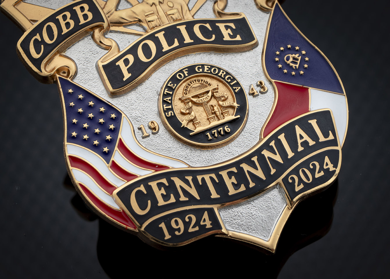 Cobb county police badge close up of centennial