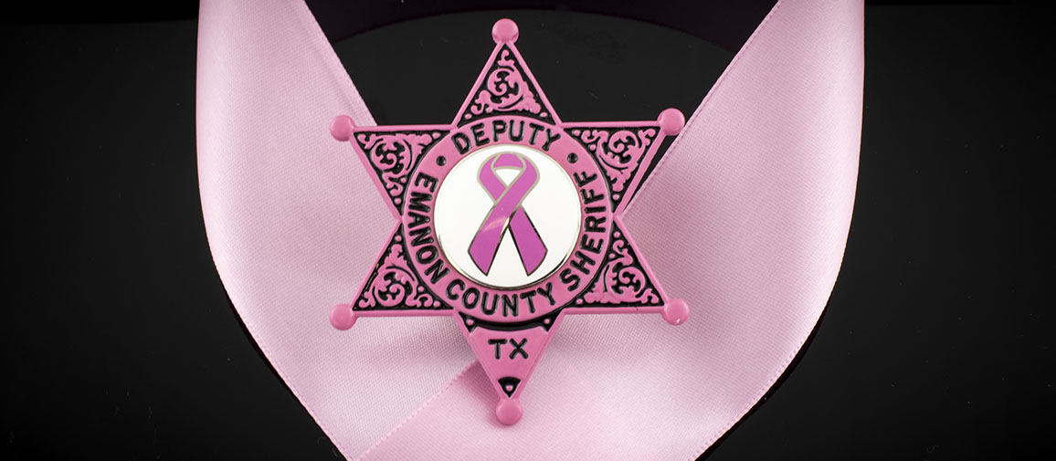 Pink six point star badge for breast cancer awareness